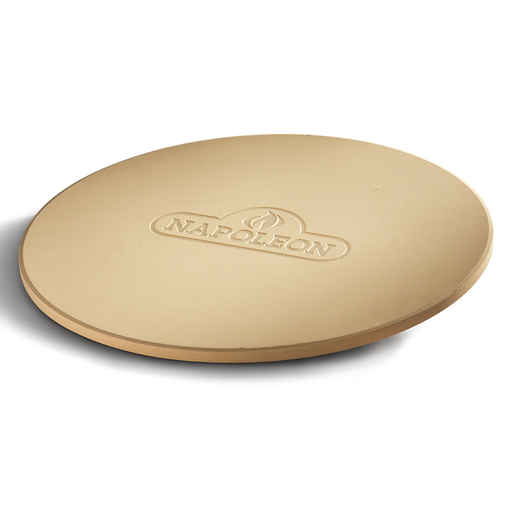 Beige Napoleon pizza stone with raised logo on round cooking surface