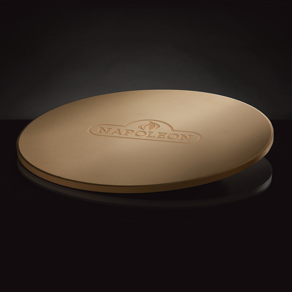 Round Napoleon pizza stone, beige cooking surface with engraved logo