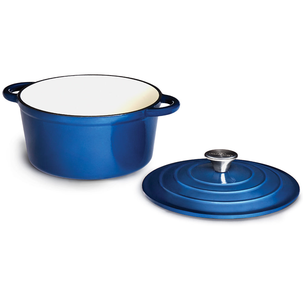 Blue cast iron round casserole dish with matching lid and knob top, side handles
