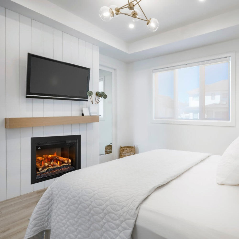 Electric fireplace insert with black surround, visible flame in a living room wall