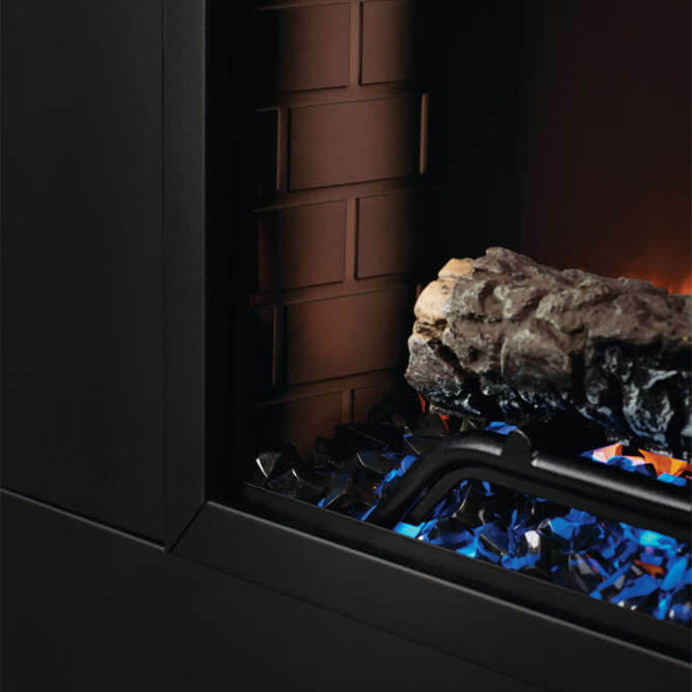 Electric fireplace log over blue crystal media with orange flame visible behind