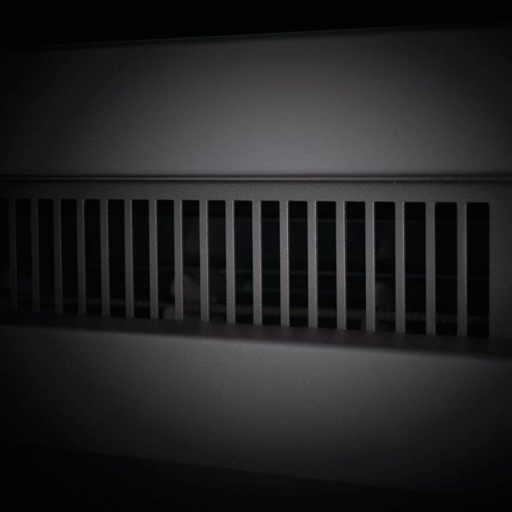 Electric fireplace front ventilation grille with evenly spaced slots