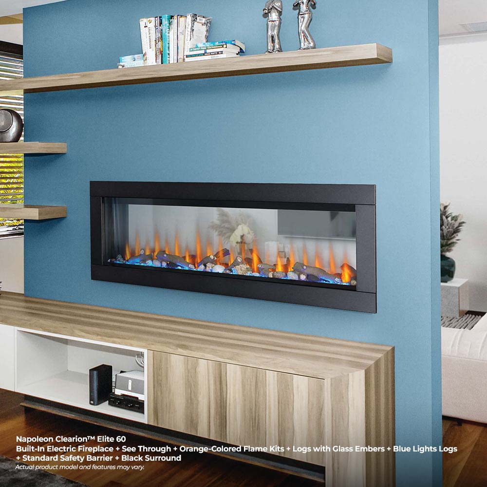 Built-in electric fireplace with black surround and orange flames over glass ember bed