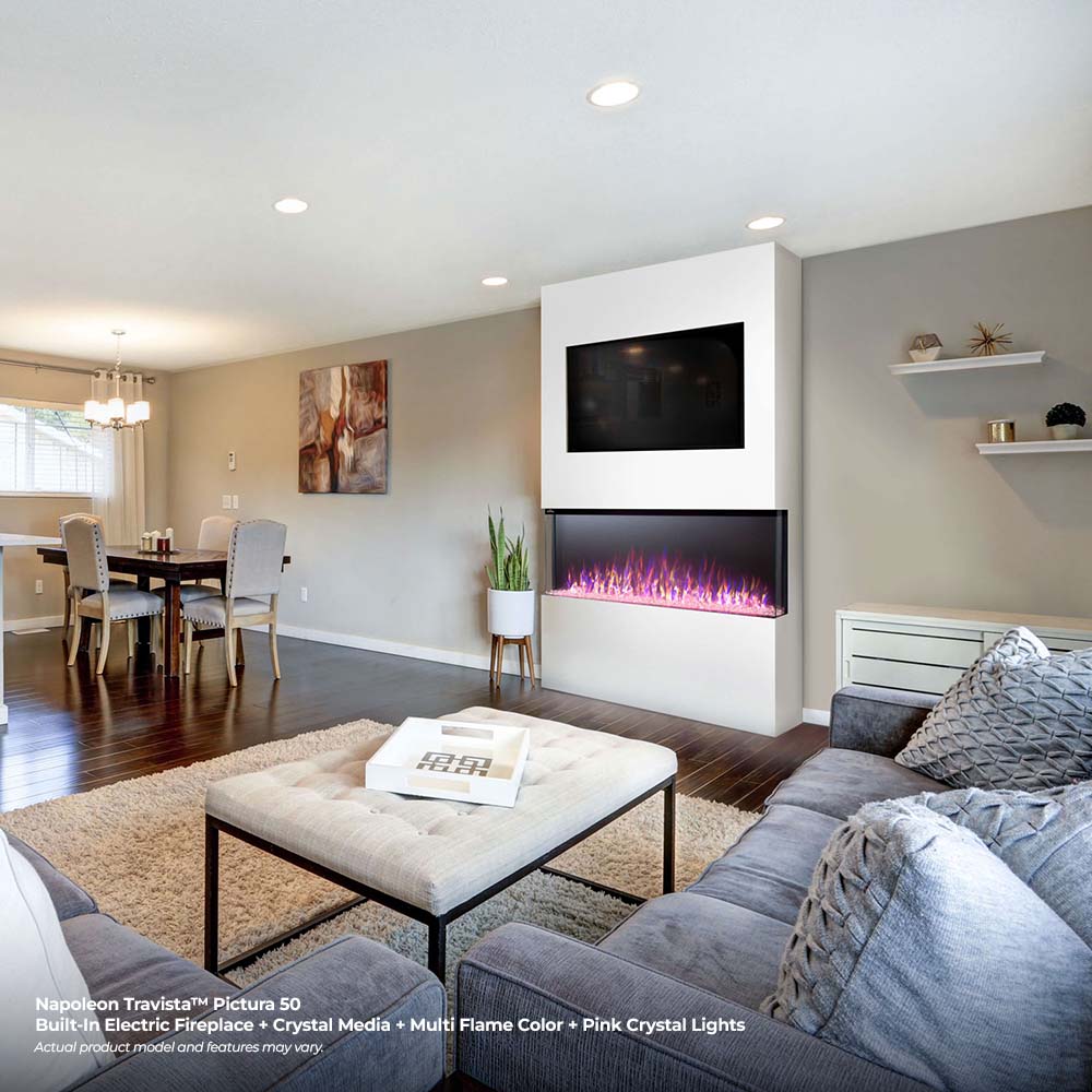 Built-in electric fireplace with black frame and bright purple-pink flame effect