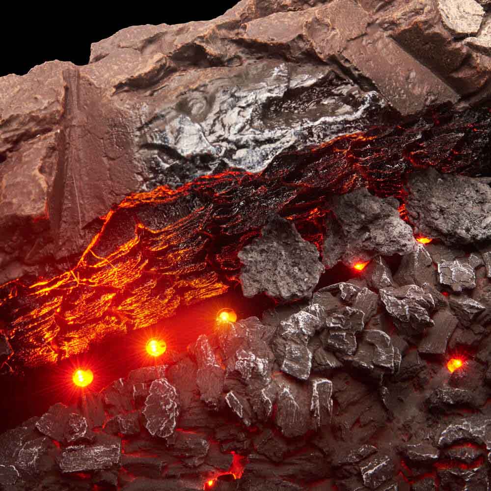 Close-up of electric fireplace embers with glowing orange and red light in rocks