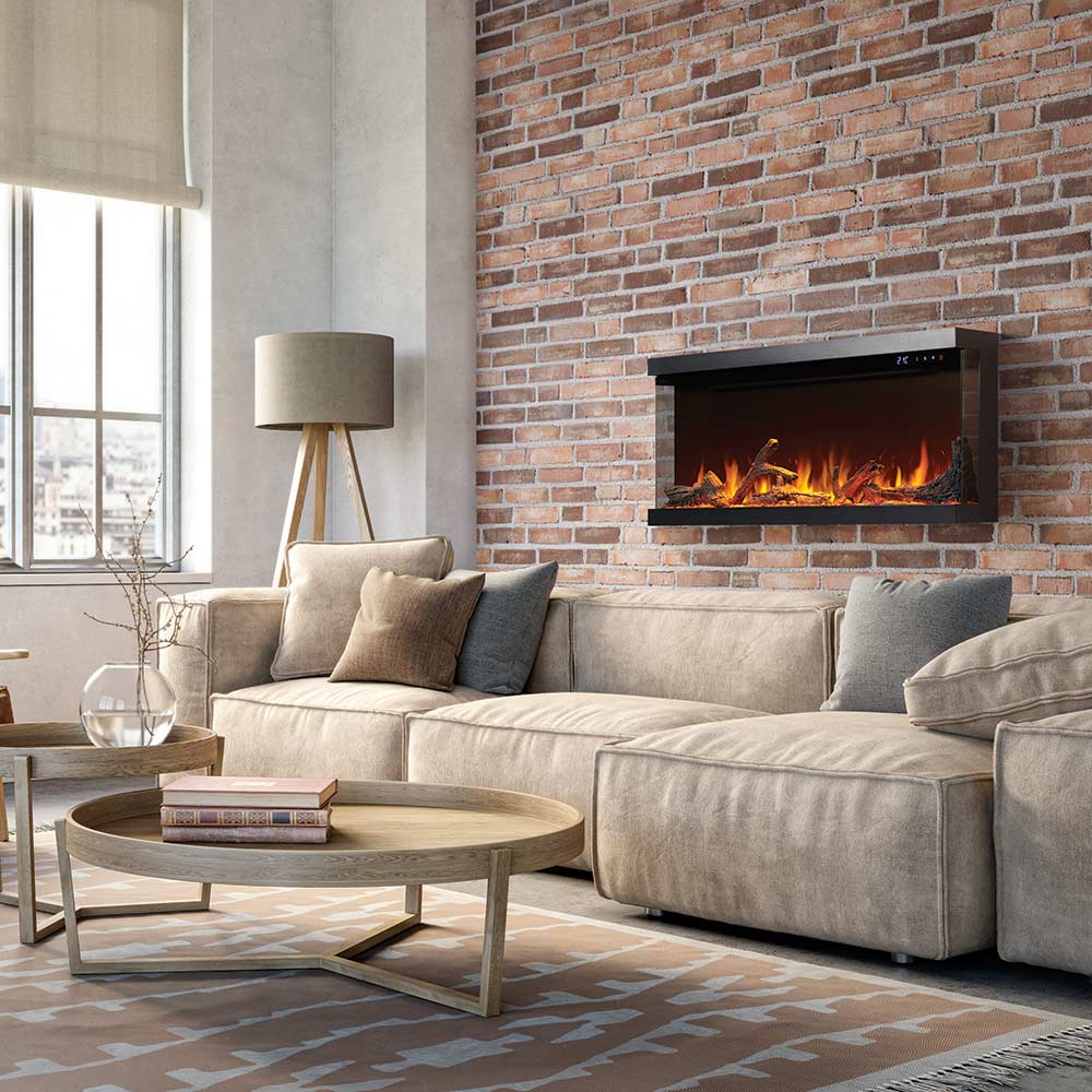Recessed electric fireplace with black surround and glowing flame in a wall opening