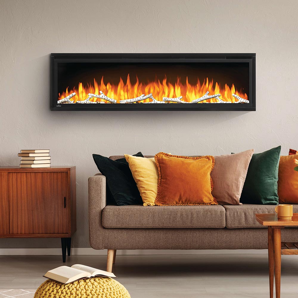 Birch log set with rocks in wall-mounted firebox, bright orange flames