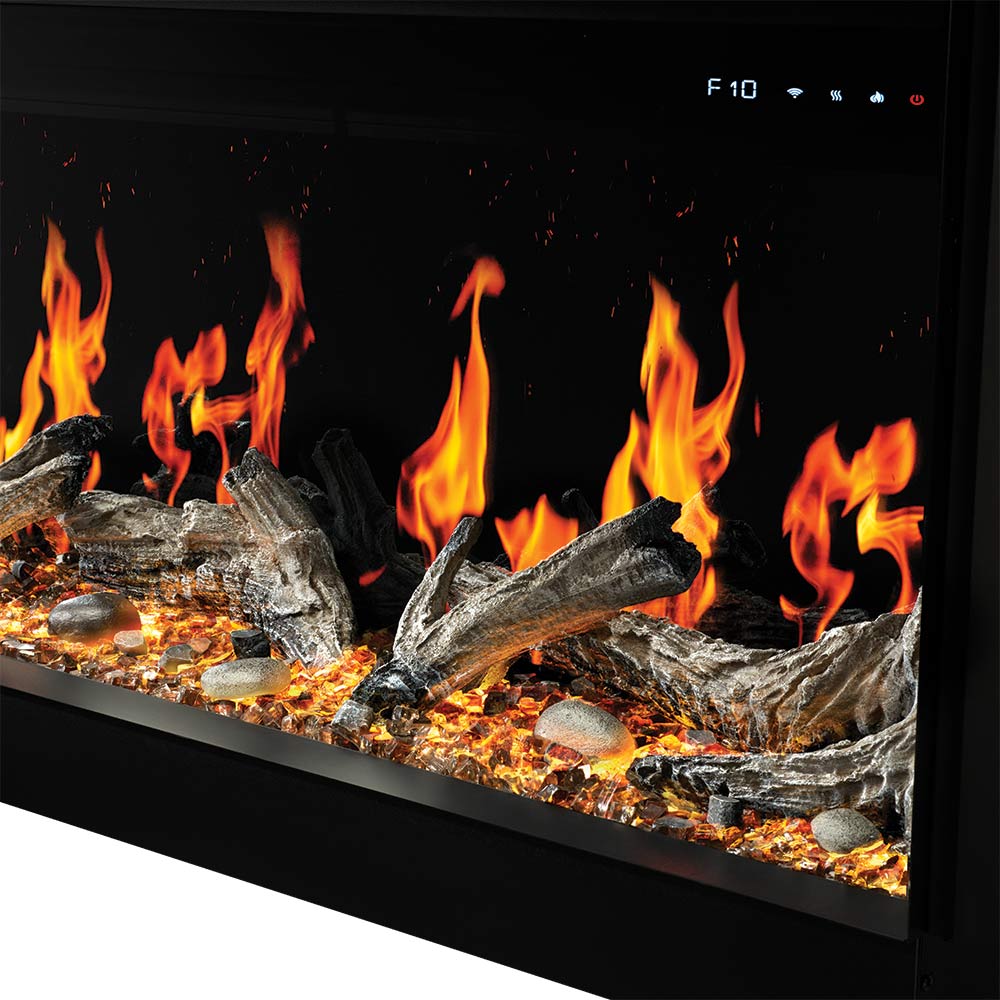 Close-up linear electric fireplace with orange flames and textured log set over embers
