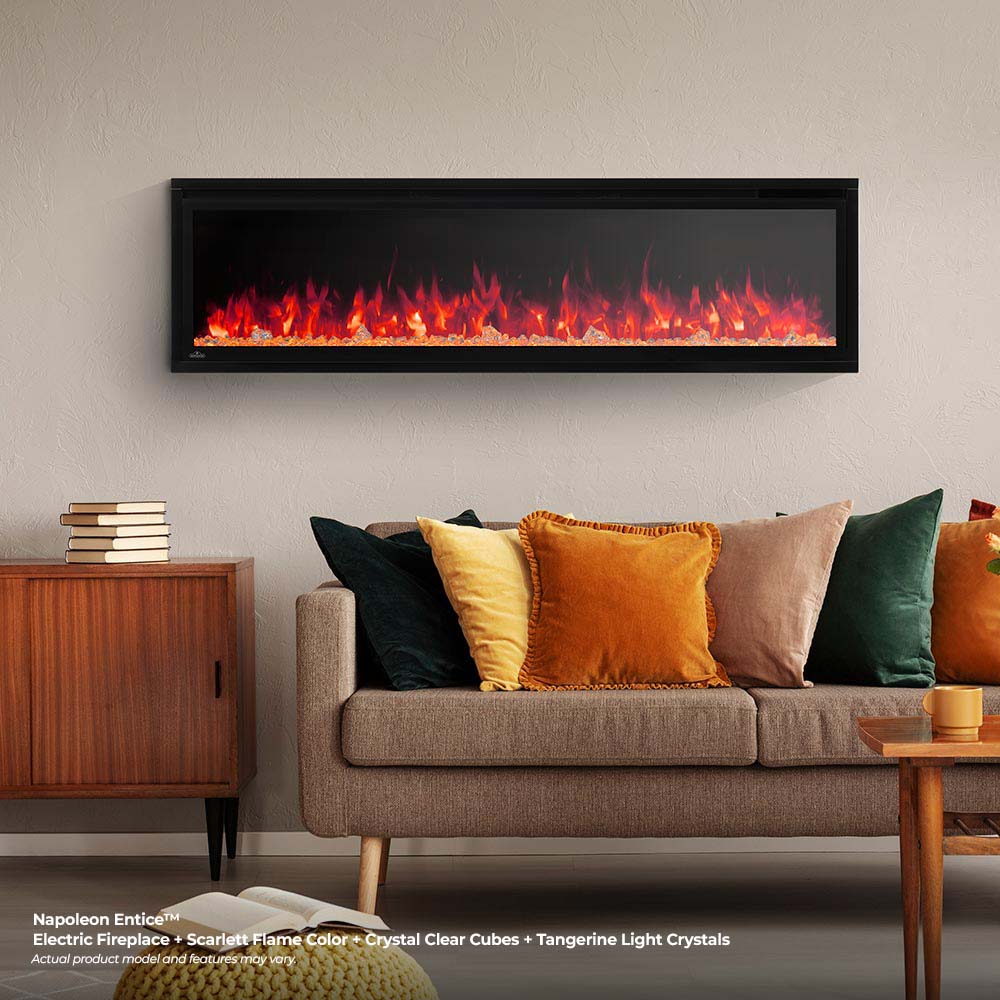 Wall-mounted electric fireplace with bright red-orange flames behind a black screen.