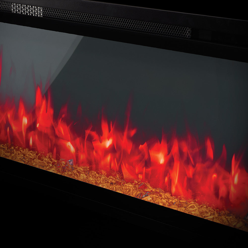 Close-up of electric fireplace flames glowing through a dark viewing window.