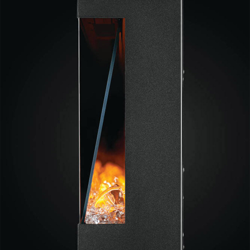 Side view of electric fireplace window showing flame and glowing embers behind glass