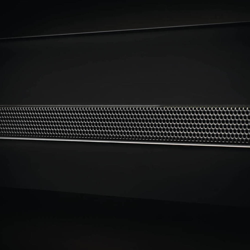 Wall mount electric fireplace front vent grille with textured metal mesh