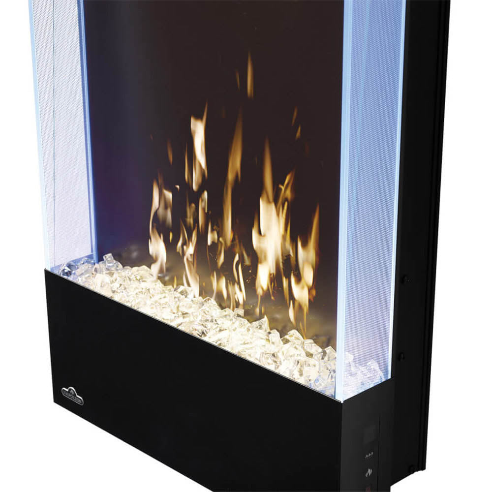 Vertical electric fireplace firebox view with golden flames and white glass embers