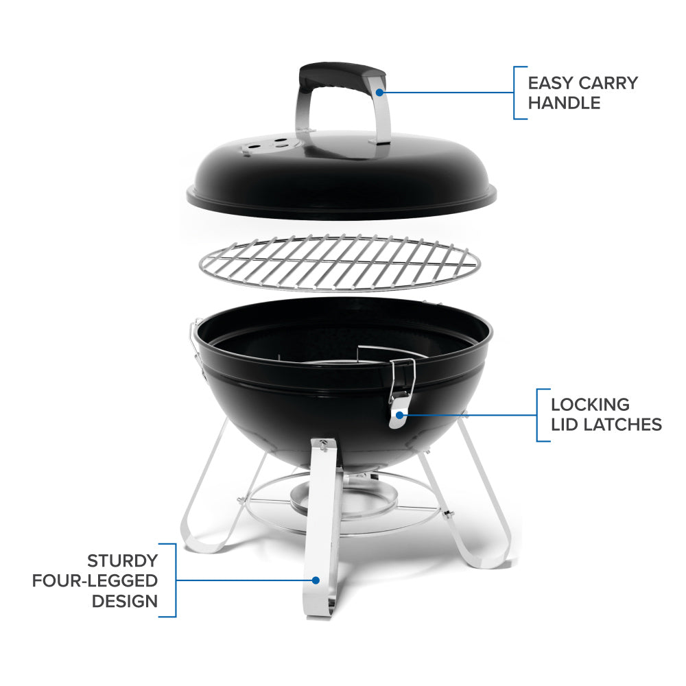 Portable charcoal kettle grill with open lid, chrome cooking grate, and side locking latches