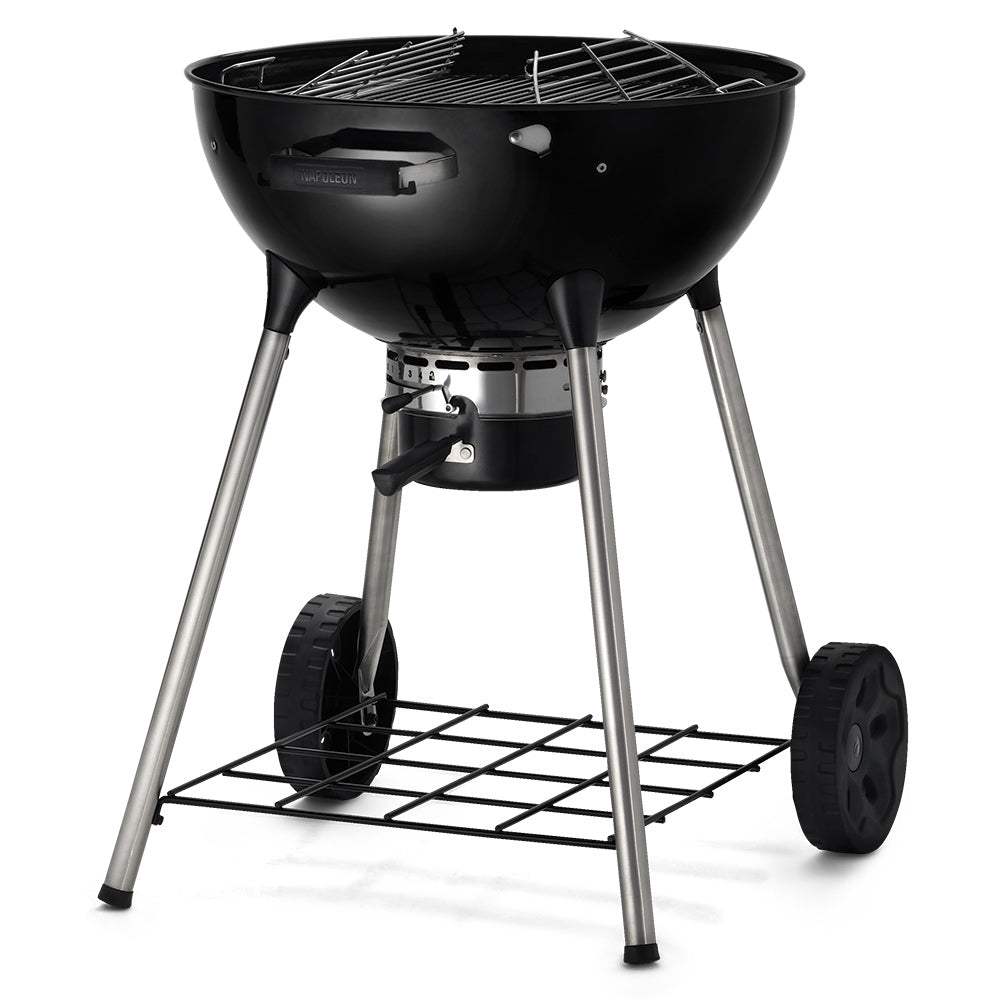 Charcoal kettle grill with chrome cooking grate and four-legged stand