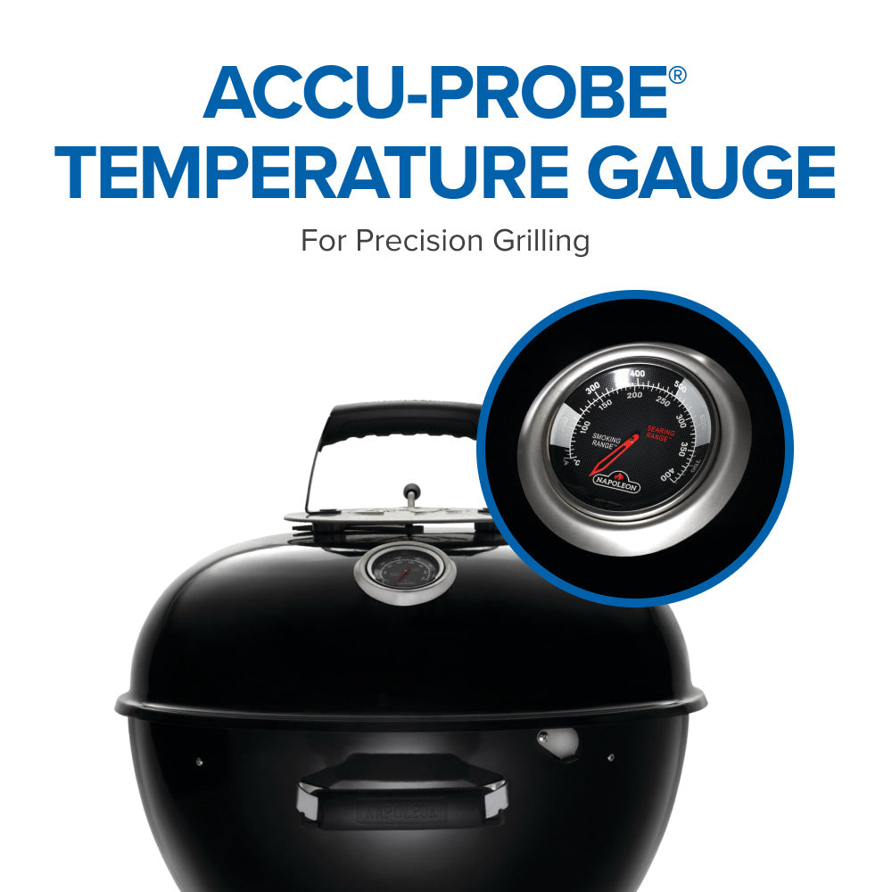 Charcoal kettle grill with temperature gauge on lid