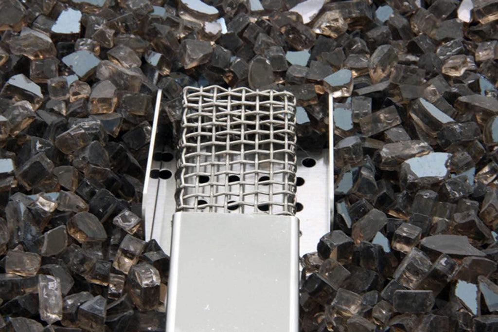 Fire table burner with chrome grate above lava rocks