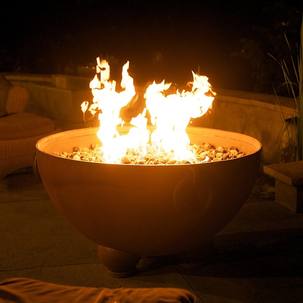 Gas fire pit bowl with flames filling the center, round side air port