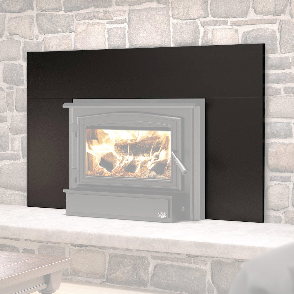 Black fireplace faceplate with large window opening, mounted on wood insert