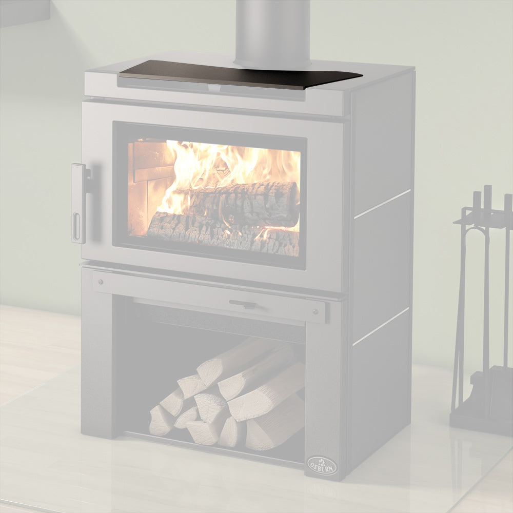 Black top panel installed on a wood stove, visible above the open firebox