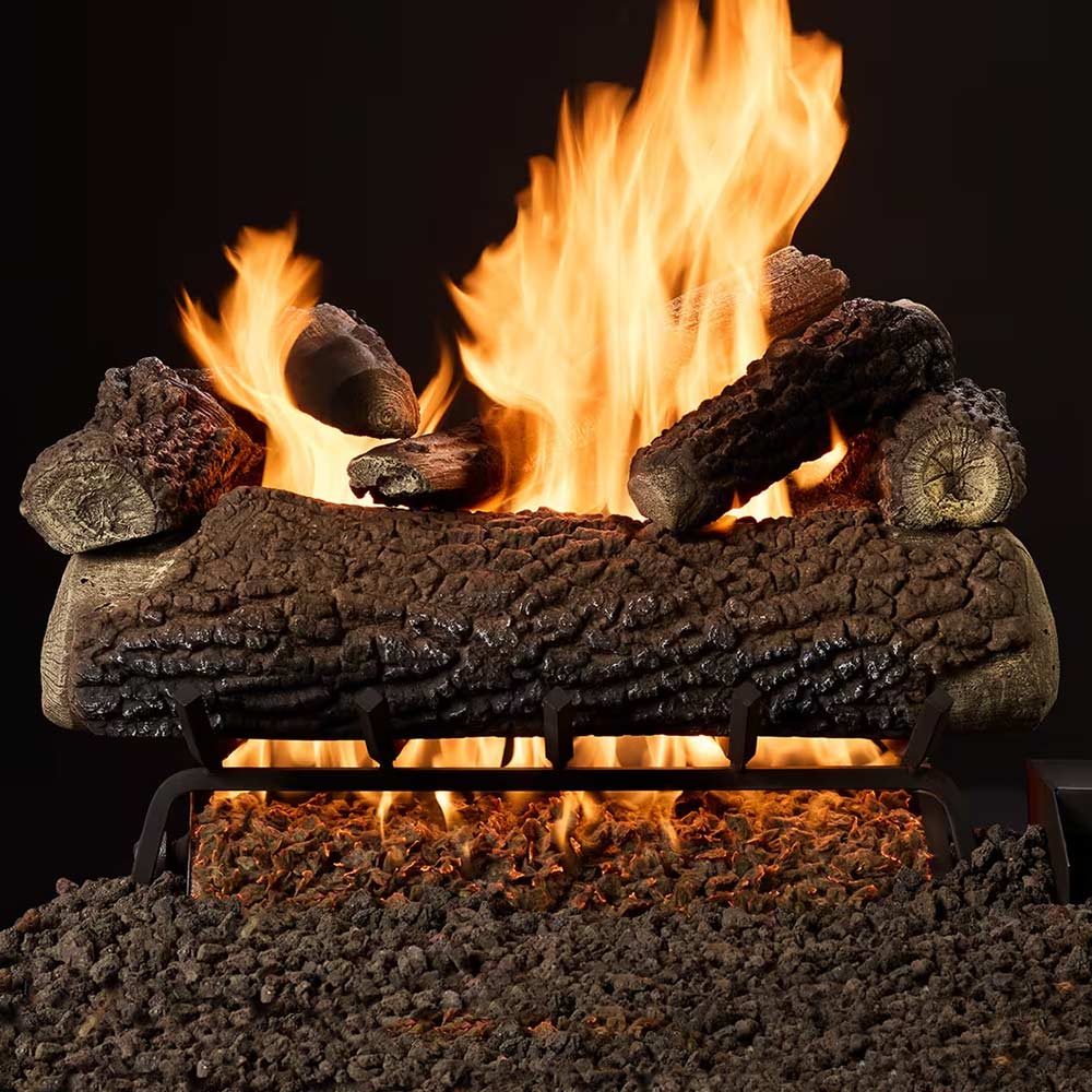 Indoor vented gas log set with burning logs and bright orange flames