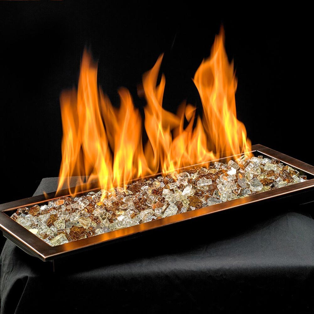 Rectangular fire pit burner pan with blue glass bed and tall orange flames
