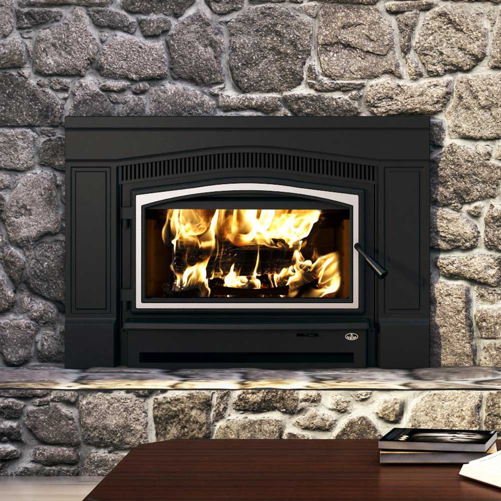 Black wood fireplace insert with glass door and burning logs