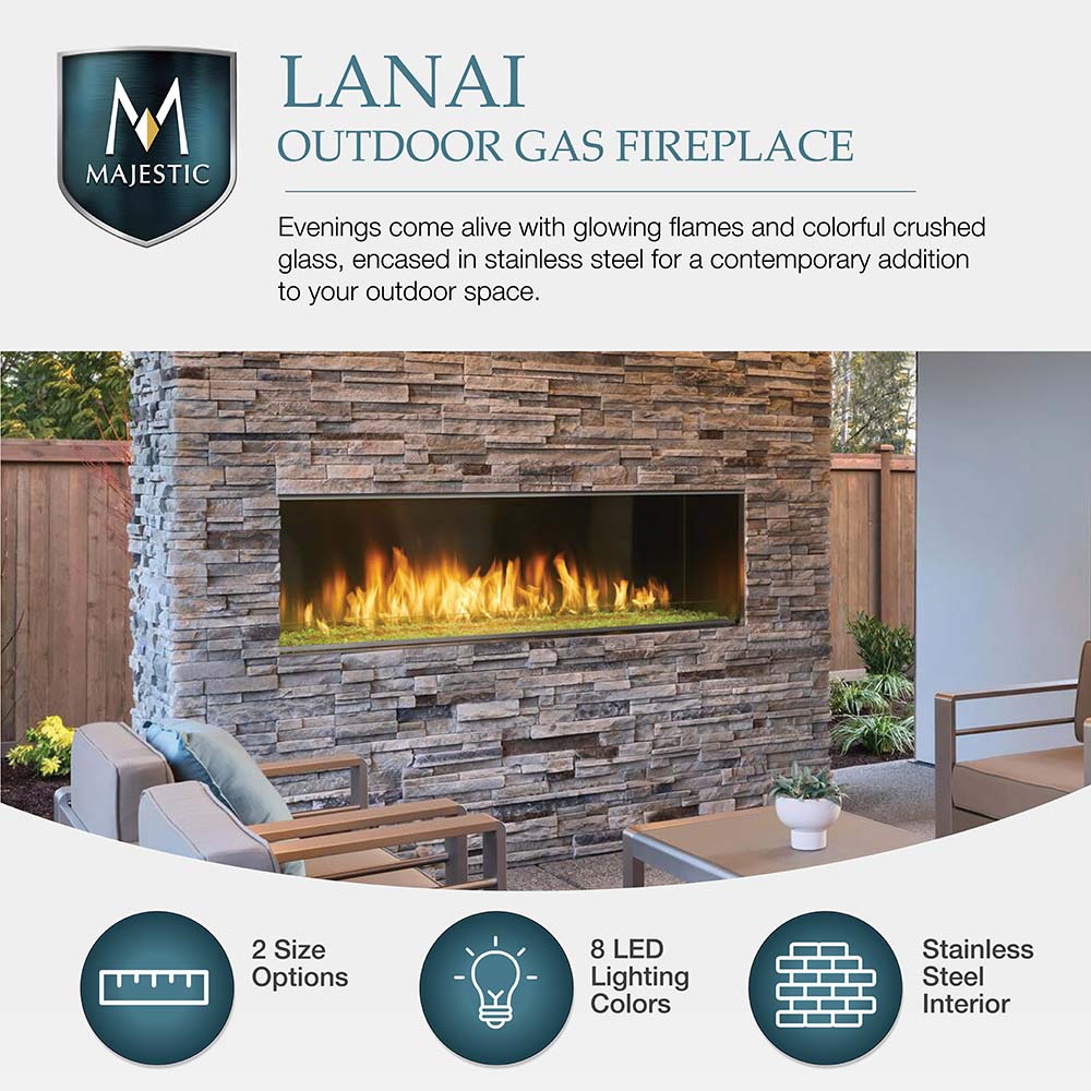 Outdoor linear gas fireplace with glowing flames and illuminated stainless interior
