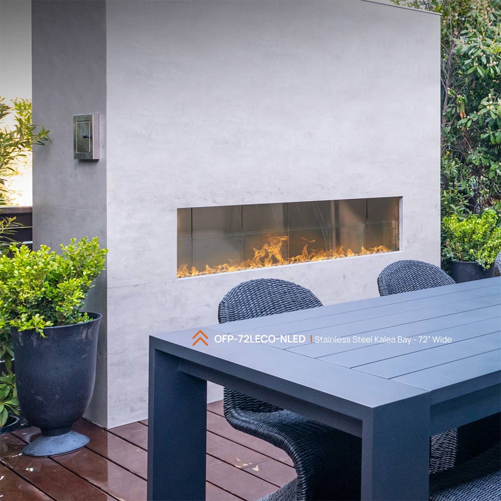 Wall-mounted linear fireplace with glass front, flames in long horizontal firebox