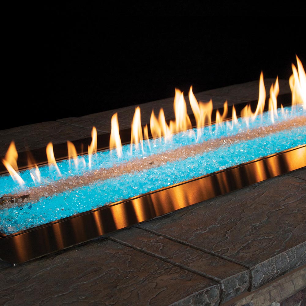 Linear gas fire pit with bronze burner and blue LED light strip with flames