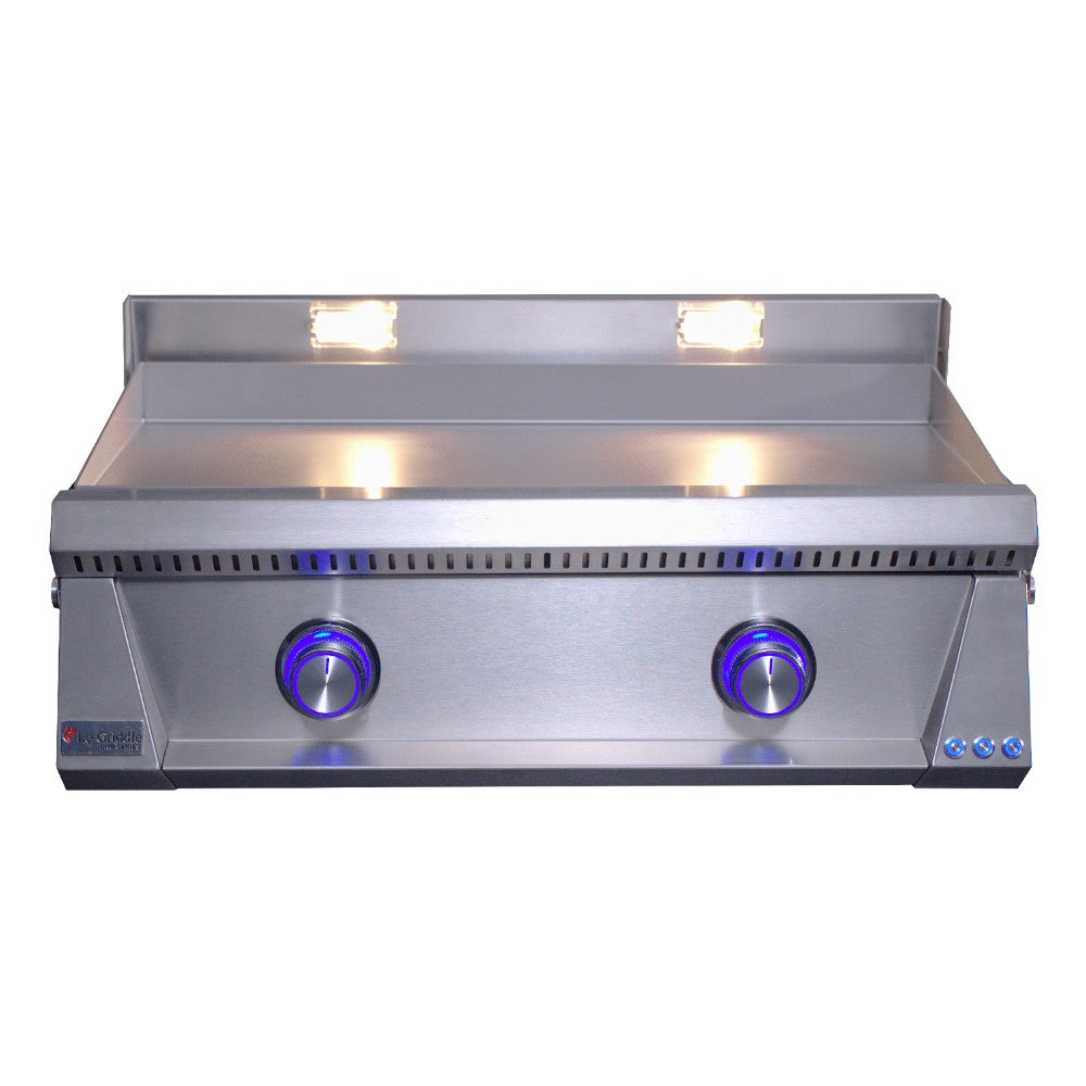 Built-in gas griddle with stainless steel body, blue control knobs, and flat cooktop