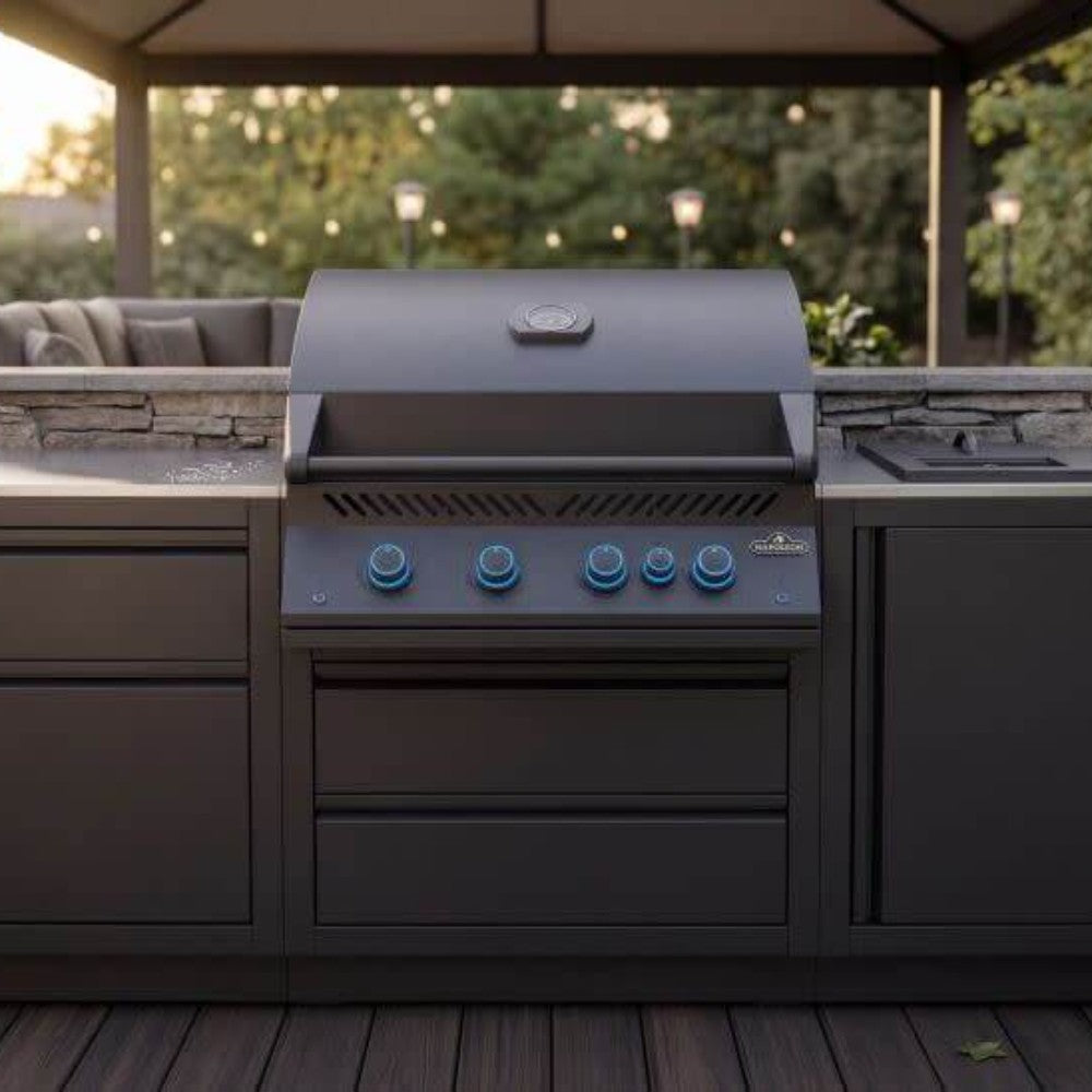 Front view of matte black built-in gas grill with control knobs and cabinet doors