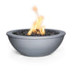 Round steel gas fire bowl in dark gray powder coat, with flame over burner rocks