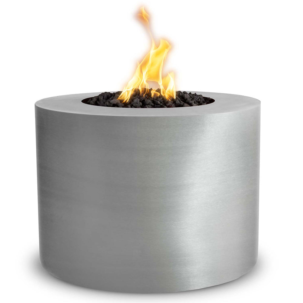 Round stainless steel gas fire pit with visible flames in center opening