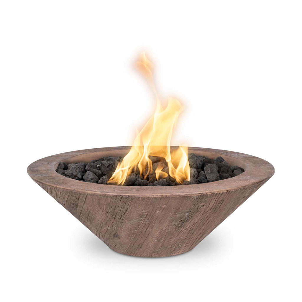 Round wood-grain concrete gas fire bowl with flames and black lava rocks, oak tone