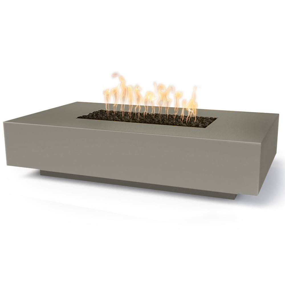 Linear concrete gas fire pit with light gray-green finish and flames in the burner tray.