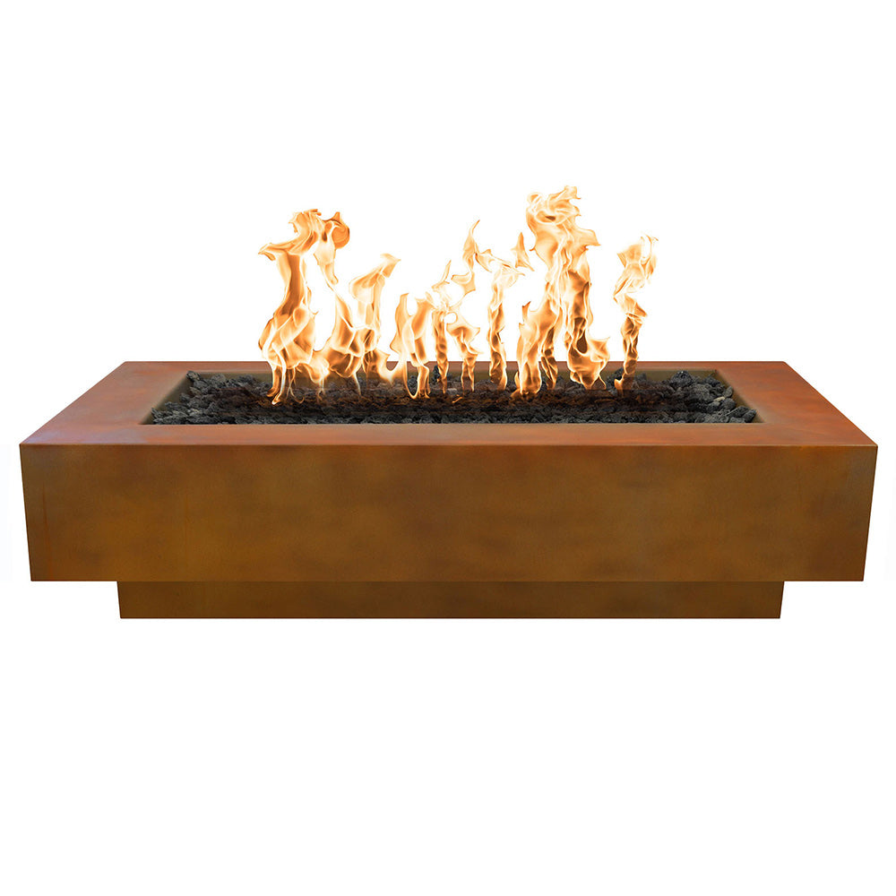 Corten steel linear gas fire pit with flames over black lava rocks