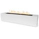 Linear concrete gas fire pit with open flame, white rectangular surround