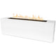 White linear gas fire pit with flames above a dark burner tray.