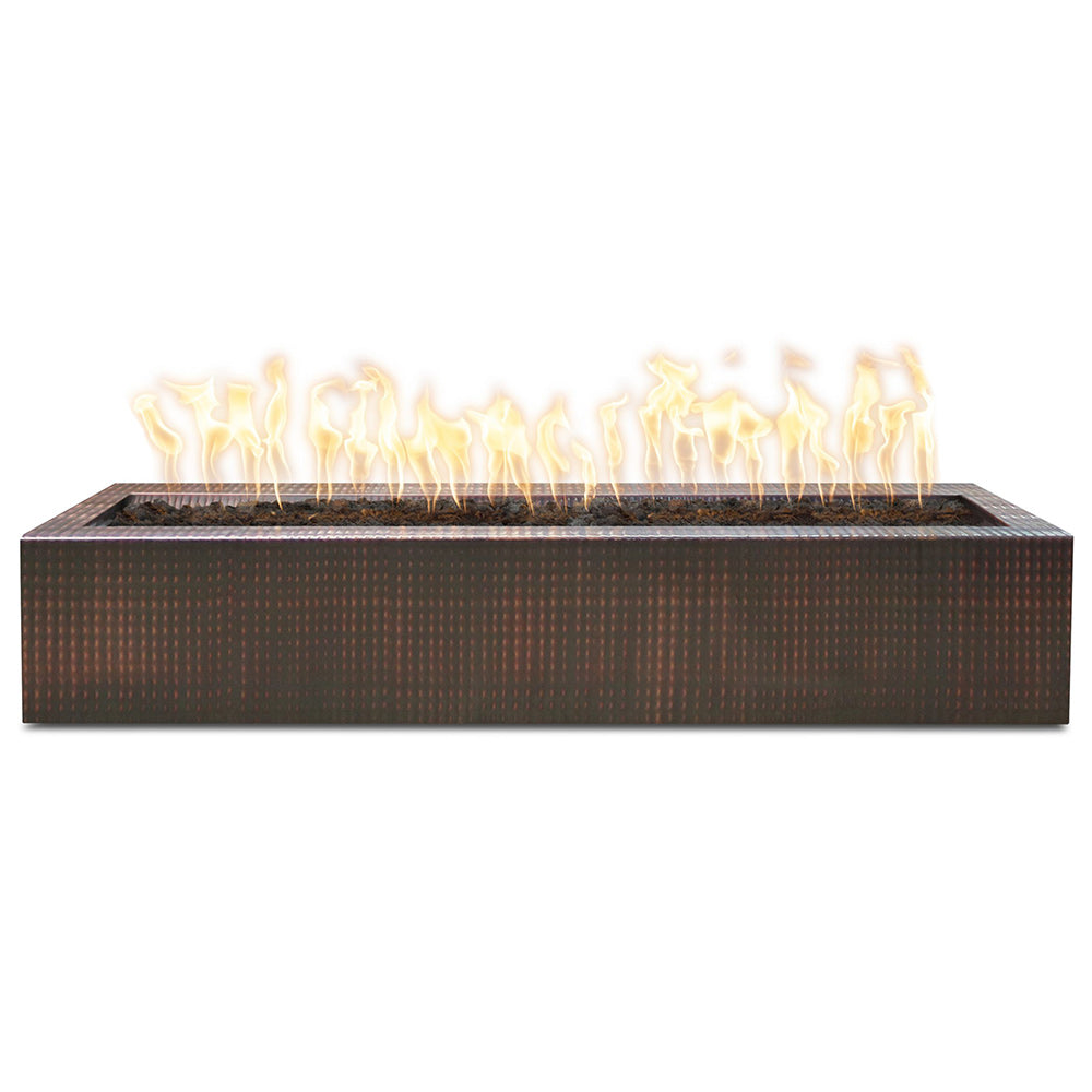 Linear gas fire pit with dark copper-toned base and visible flames