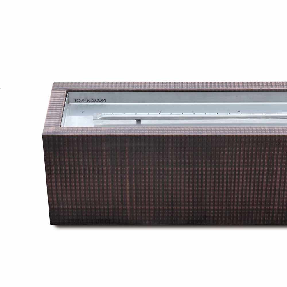 Linear gas fire pit side view with empty burner tray inside dark cabinet