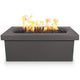 Dark gray linear concrete gas fire pit with flames above black fire media