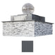 Outdoor gas fire and water bowl with gray stone surround and silver dome burner cover