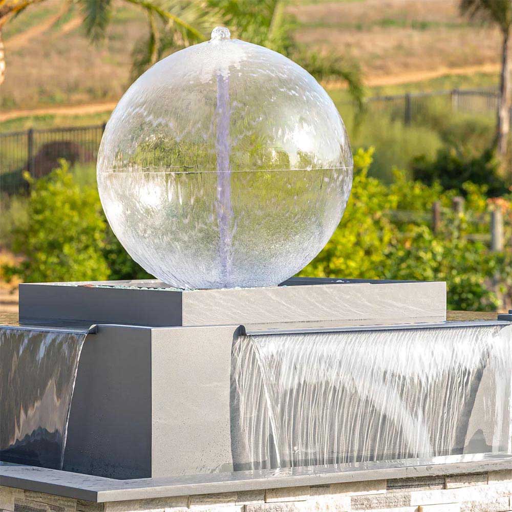 Silver sphere centerpiece over square gas fire & water bowl with cascading water sheet