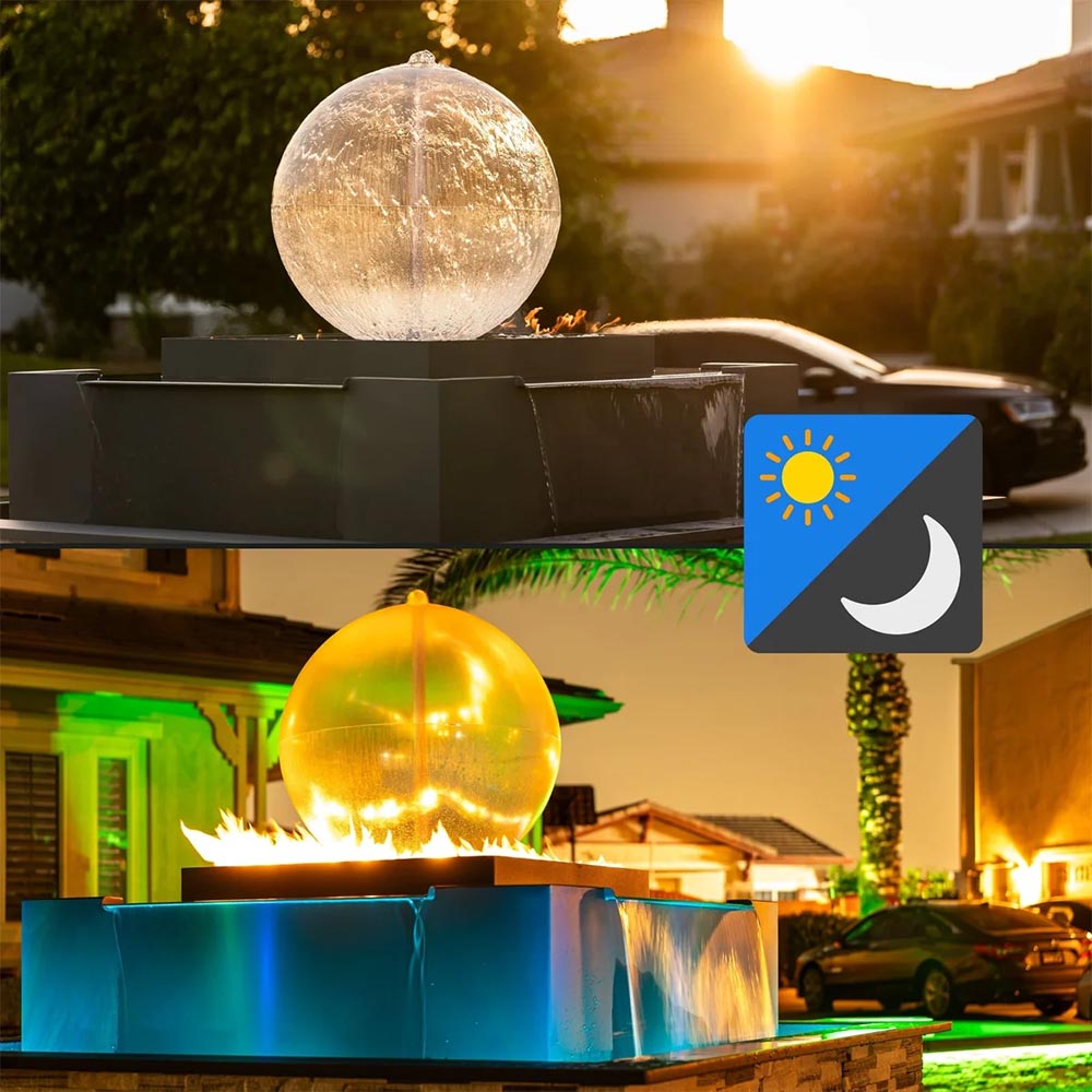 Outdoor gas fire and water bowl with glowing sphere, blue-lit pool, and open flame