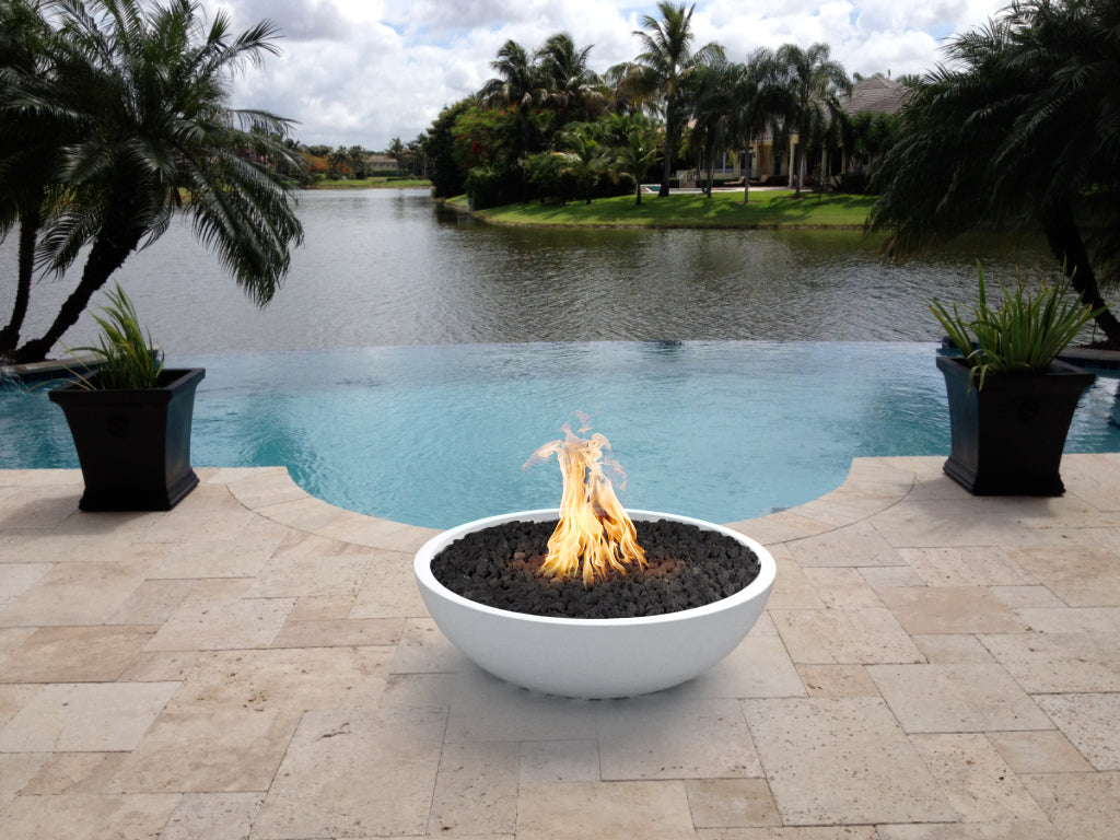 Sedona round concrete gas fire bowl with flames in a white finish