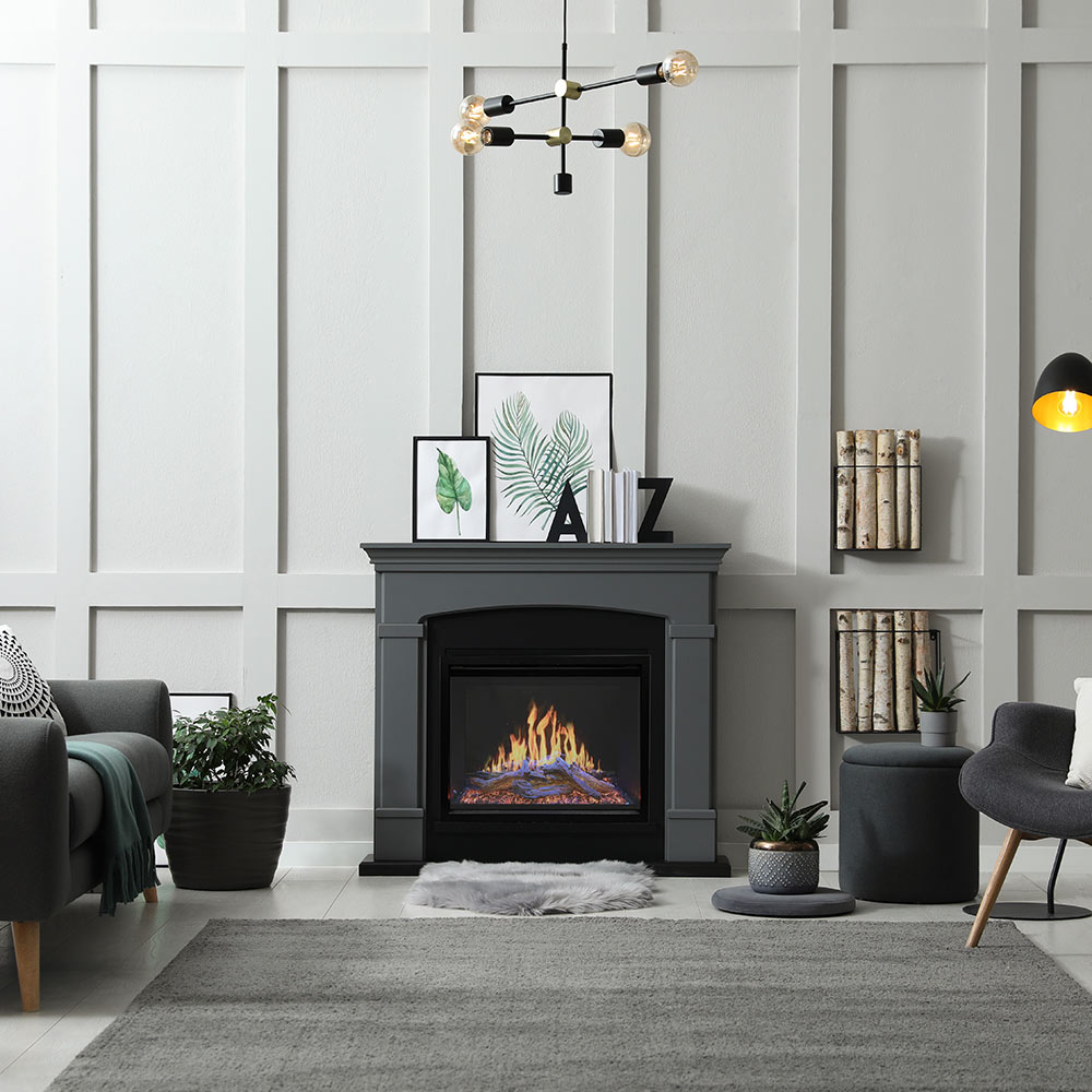 Built-in electric fireplace mantel with dark gray surround and flame insert