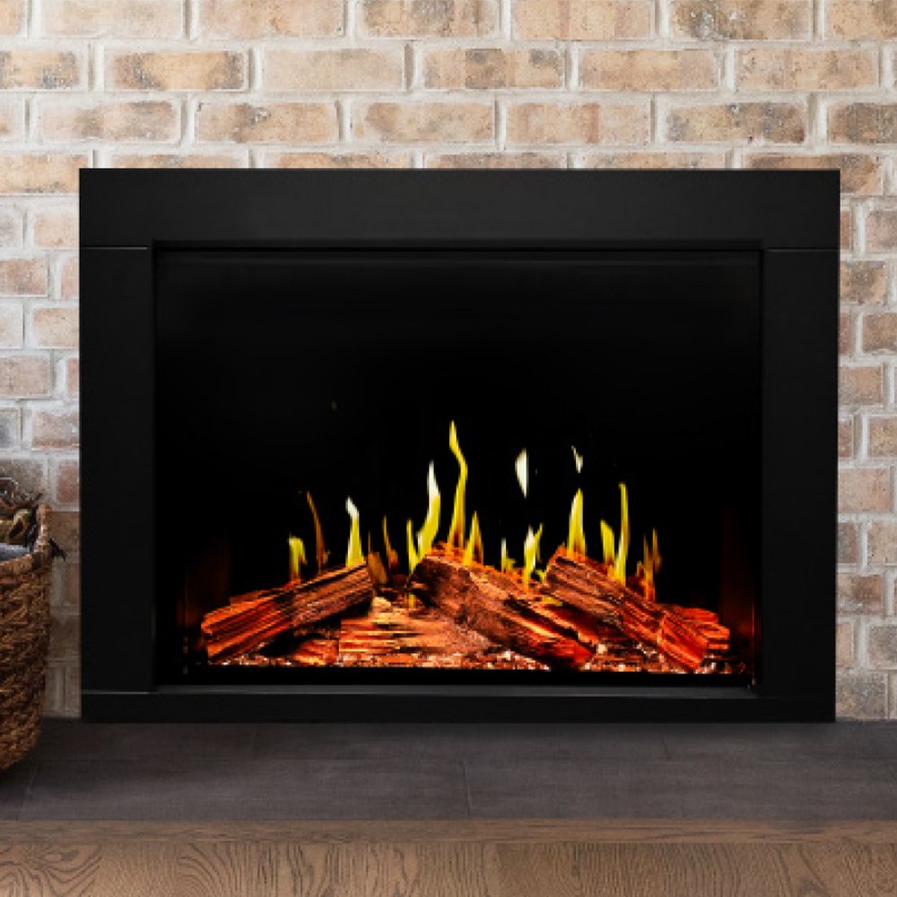 Black electric fireplace insert with orange and yellow flame effect on log bed