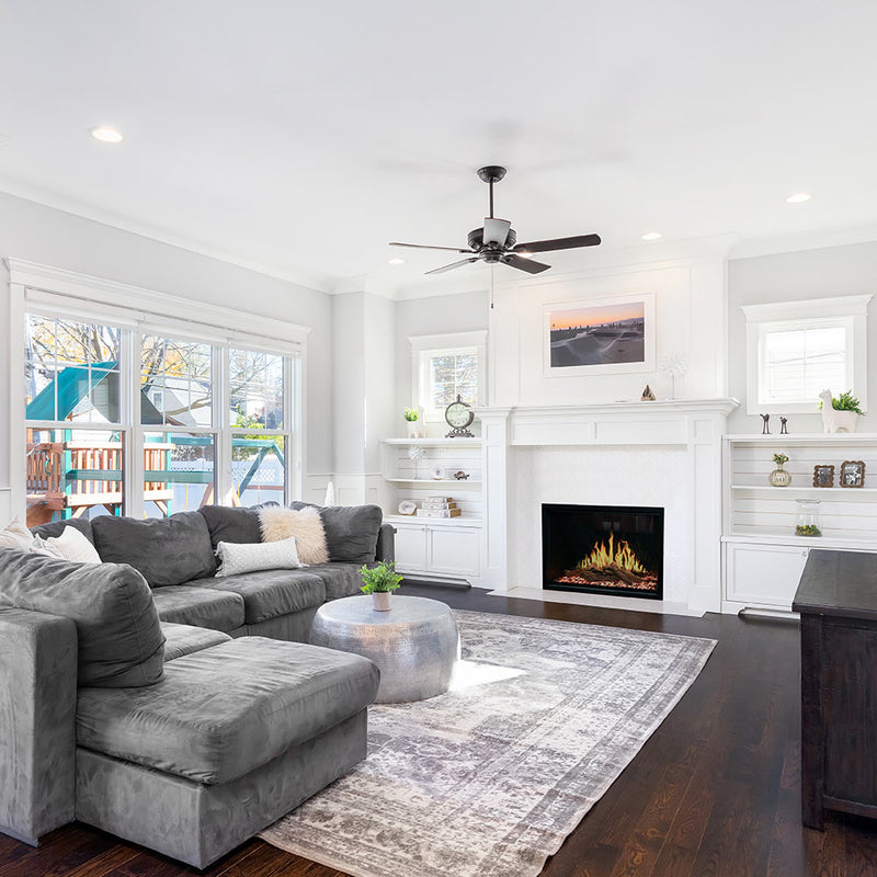 Built-in electric fireplace insert showing glowing flames and black glass surround