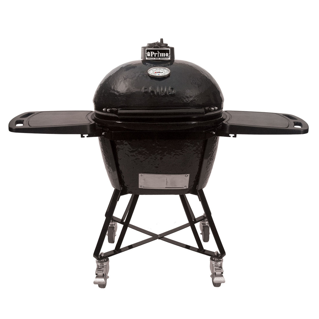 Large oval ceramic kamado grill with black dome and wheeled stand